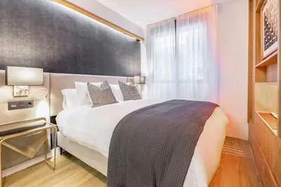 Cama o camas de una habitación en BHost - La Sacristía
