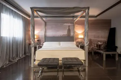 Cama o camas de una habitación en Hotel Infanta Leonor