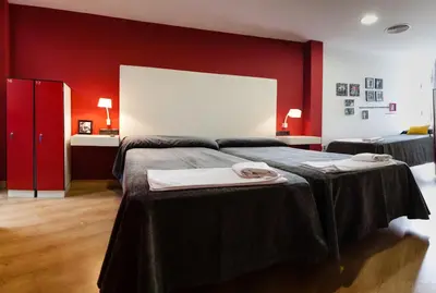 Cama o camas de una habitación en Ritual Alameda Sevilla