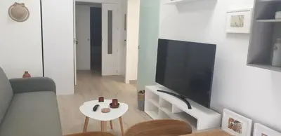 Una televisión o centro de entretenimiento en CIUDAD JARDÍN - CONFORT CÓRDOBA CENTRO III