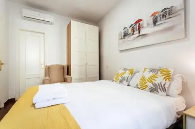 Cama o camas de una habitación en Alohamundi Joaquín Costa