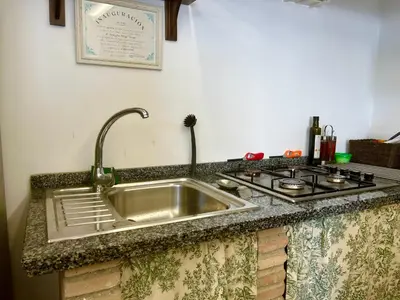 Una cocina o zona de cocina en El Txoko Andaluz