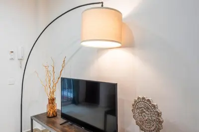 Una televisión o centro de entretenimiento en Alohamundi Montesión