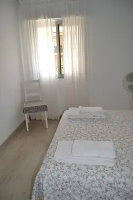 Cama o camas de una habitación en Cozy and well connected apartment