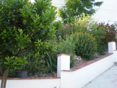 Jardín al aire libre en Apartamentos Rurales El Cañuelo de Carcabuey