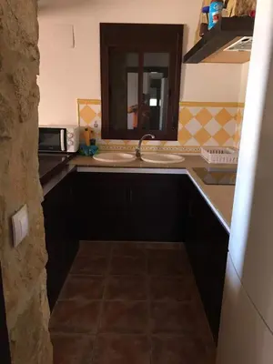 Una cocina o zona de cocina en La sombra del lagarto