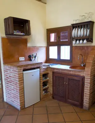 Una cocina o zona de cocina en Paraiso del Hueznar