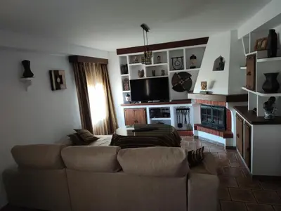 Una televisión o centro de entretenimiento en CASA LAURA