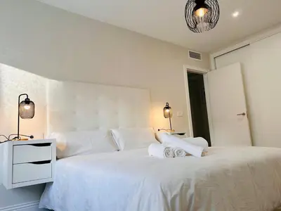 Cama o camas de una habitación en Gran Capitán Home