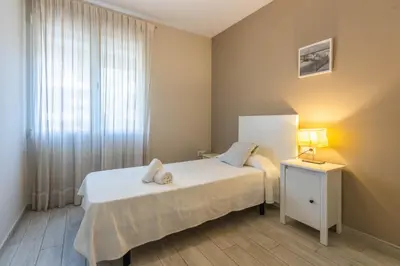 Cama o camas de una habitación en Apartamento Al Medina Córdoba