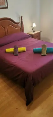 Cama o camas de una habitación en HOGAREÑO ADOSADO EN EL PUEBLO DE ARDALES