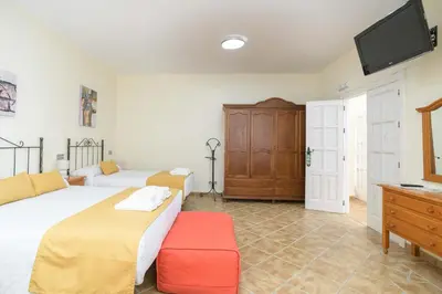 Cama o camas de una habitación en Casa Rural La Loma Granero