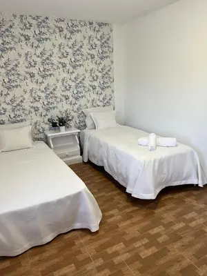 Cama o camas de una habitación en Villa Carmen