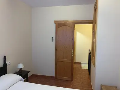 Cama o camas de una habitación en La Cueva