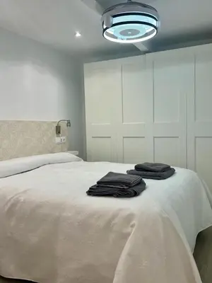 Cama o camas de una habitación en SANTA CLARA Con opción a Parking