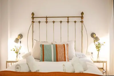 Cama o camas de una habitación en Santiago Suite Home