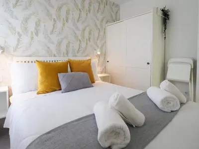 Cama o camas de una habitación en Tinte Boutique Suite