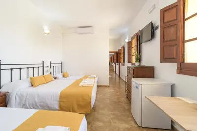 Cama o camas de una habitación en Casa Rural La Loma