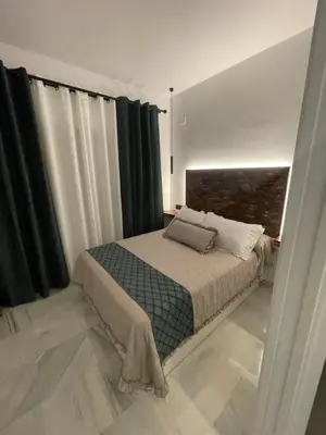 Cama o camas de una habitación en WISH SUITE PONCE DE LEON