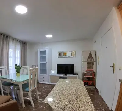 Una televisión o centro de entretenimiento en Apartamento García Requena
