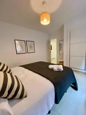 Cama o camas de una habitación en Apartamento nuevo en centro 19743