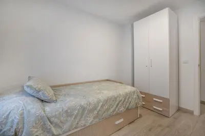 Cama o camas de una habitación en Apto Vallellano junto al casco histórico & Parking incluido