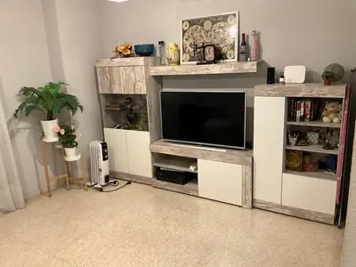 Una televisión o centro de entretenimiento en Céntrico Apartamento Santa Justa