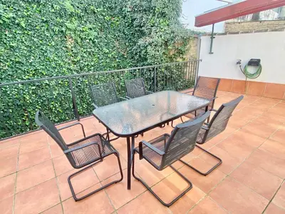 Un patio o zona al aire libre en La Casa de Enfrente