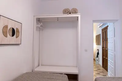 Cama o camas de una habitación en Apartamentos San Francisco