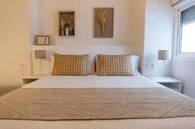 Cama o camas de una habitación en Apartamentos San Francisco