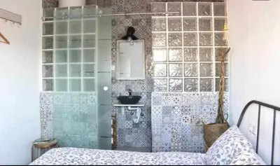 Cama o camas de una habitación en SEVILLA ROOM, VIEW TO THE CITY