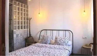 Cama o camas de una habitación en SEVILLA ROOM, VIEW TO THE CITY