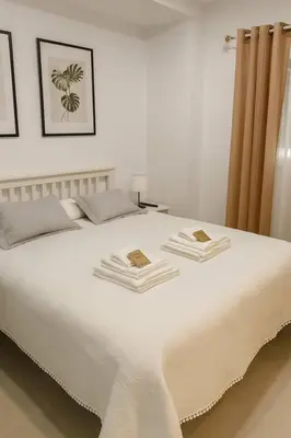 Cama o camas de una habitación en Alojamiento Baeza California 4B