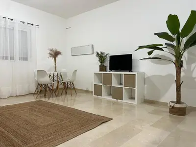 Una televisión o centro de entretenimiento en Alojamientos Claus
