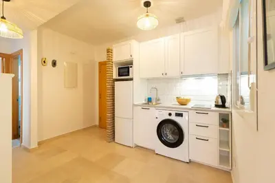 Una cocina o zona de cocina en Charming 2 Bedroom Apartment at San Marcos Plaza by OCityzen