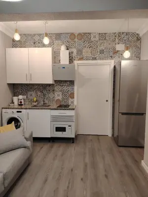 Una cocina o zona de cocina en Serendipity Hispalis Nervión