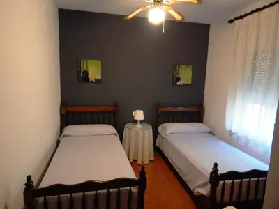 Cama o camas de una habitación en Villa María - Pista de Padel y Piscina
