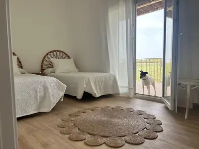 Cama o camas de una habitación en Casa Caraza. Un olivar con vistas al castillo de Juego de Tronos
