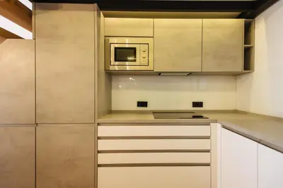 Una cocina o zona de cocina en Loft Patricia Nervión