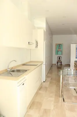 Una cocina o zona de cocina en Nuevo Estudio moderno, agradable y cómodo