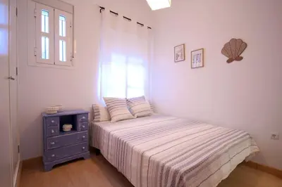 Cama o camas de una habitación en Sevilla centro- Sol - Acogedor y luminoso