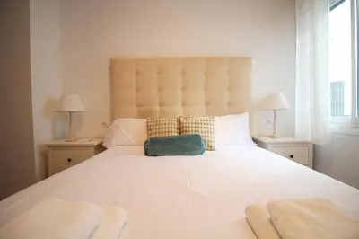 Cama o camas de una habitación en Sevilla centro - Carrión Mejías