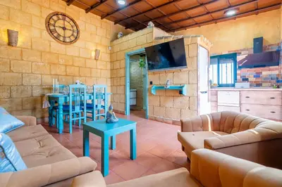 Una televisión o centro de entretenimiento en Casa Rural Carmo