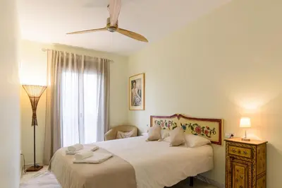 Cama o camas de una habitación en Lovely apartment in Sevilla