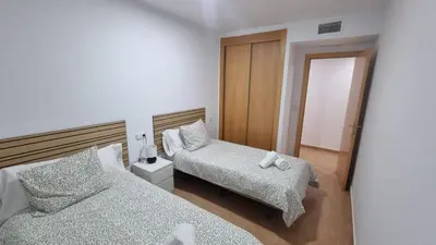 Cama o camas de una habitación en Moderno Apartamento 3 dormitorios y piscina