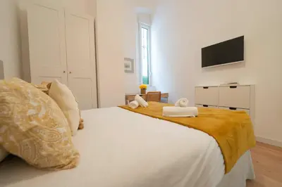 Cama o camas de una habitación en Apartamento a estrenar junto al centro de la ciudad