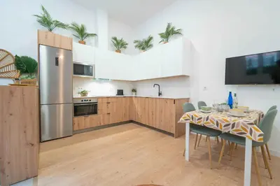 Una cocina o zona de cocina en Apartamento a estrenar junto al centro de la ciudad