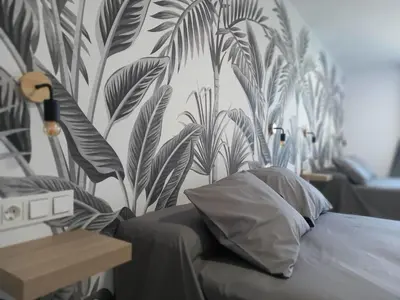 Cama o camas de una habitación en Casa Fénix, en el centro de Andalucía