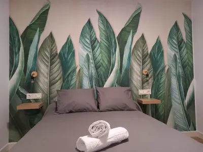 Cama o camas de una habitación en Casa Fénix, en el centro de Andalucía