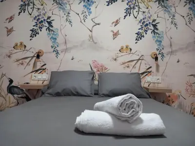 Cama o camas de una habitación en Casa Fénix, en el centro de Andalucía
